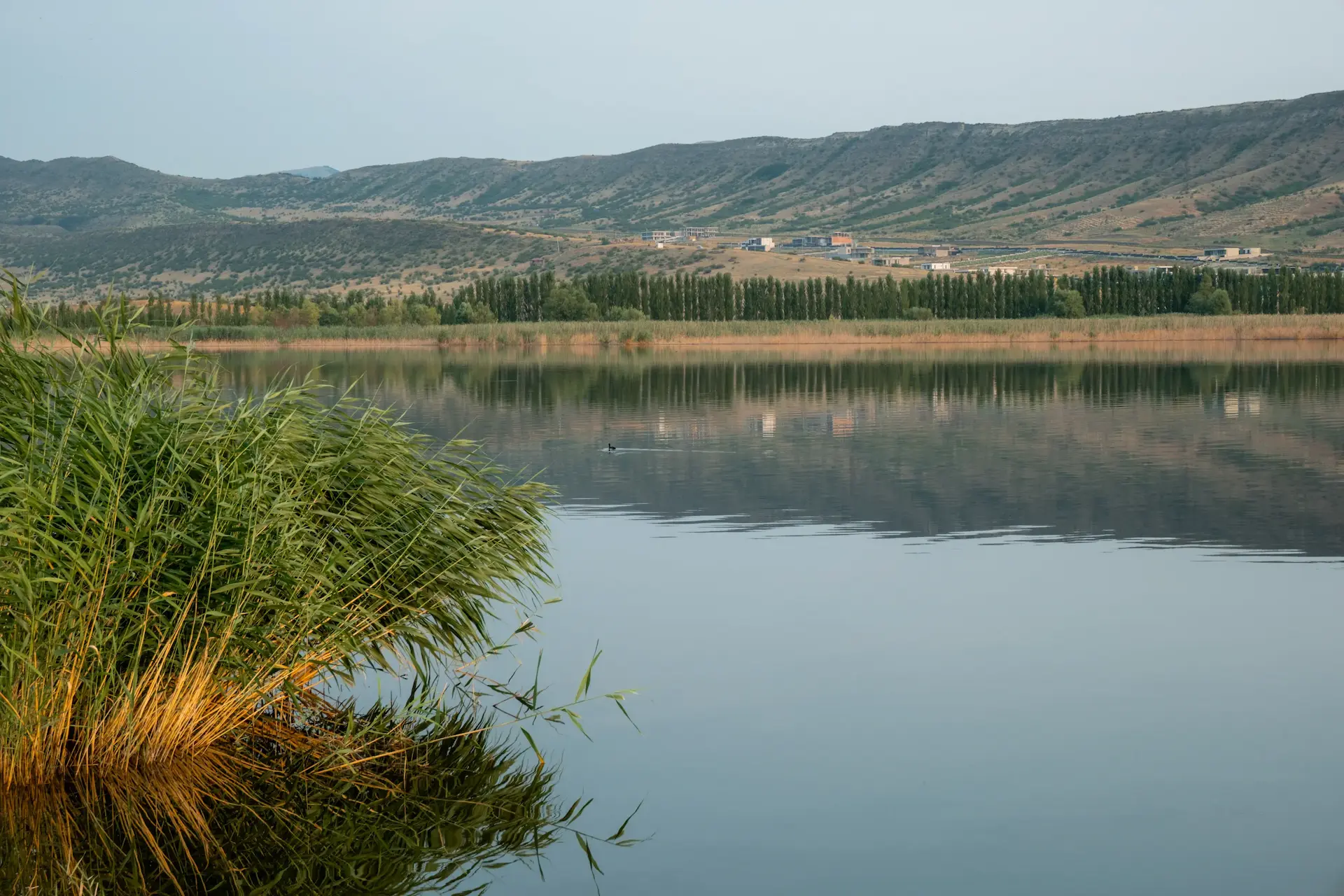 YOUR HOME <br/> OVER THE LAKE